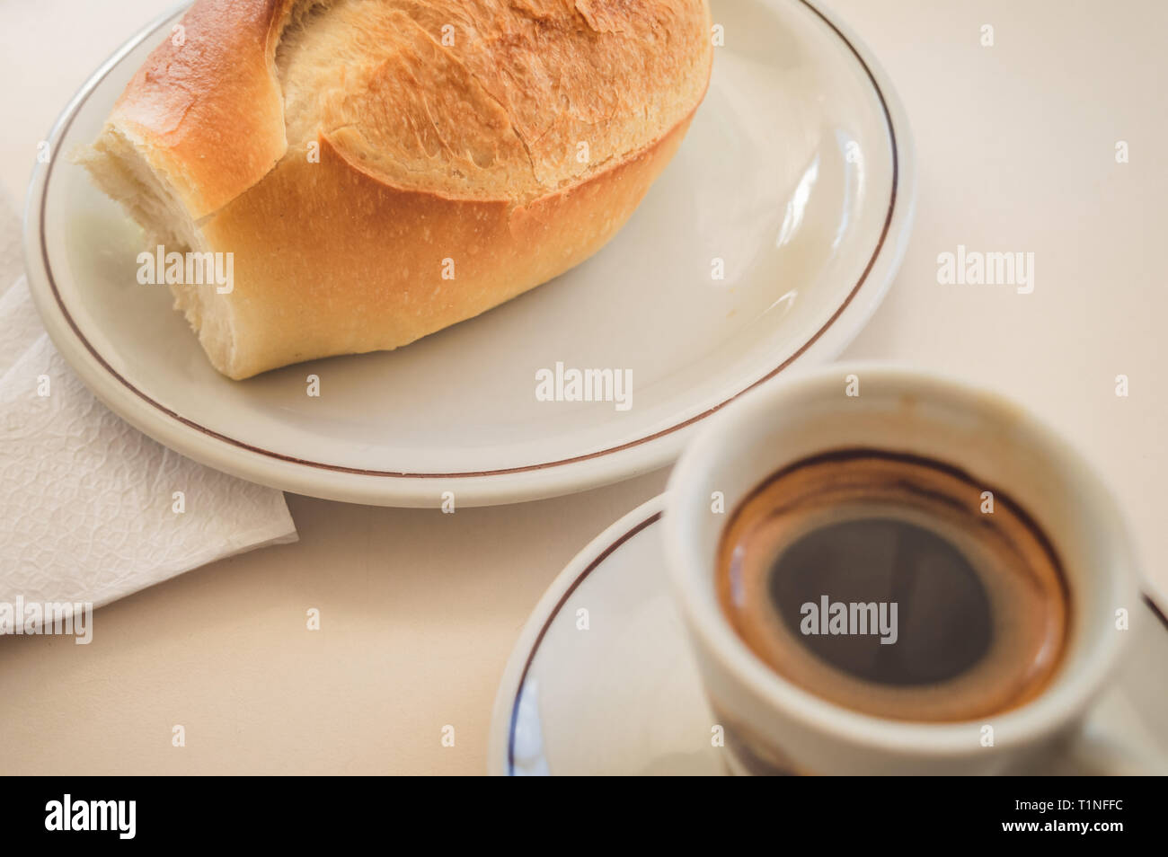 Coffee cup and roll bread Stock Photo Alamy
