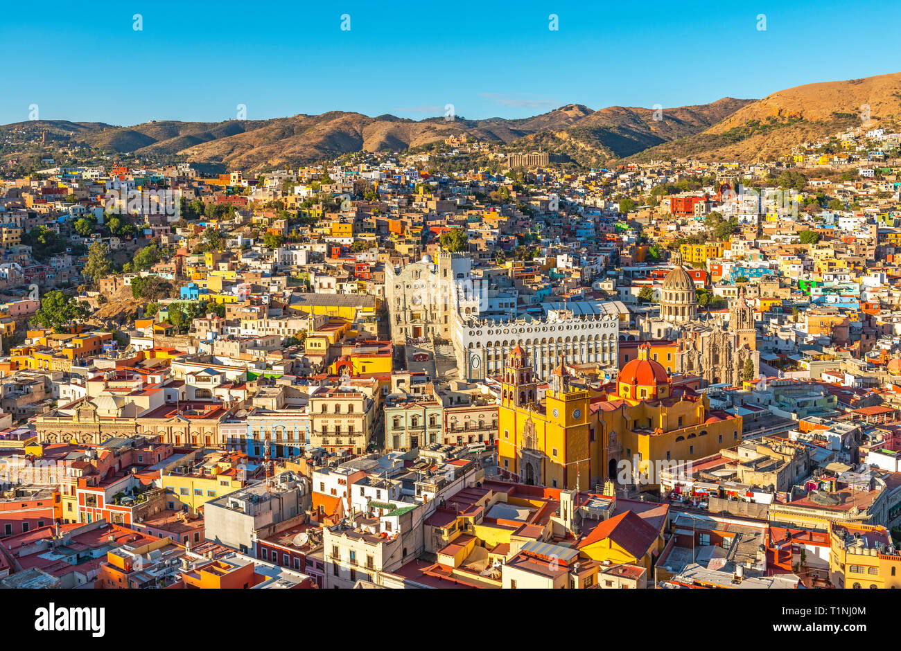 The colourful urban skyline of Guanajuato city during sunset, Mexico. Stock Photo