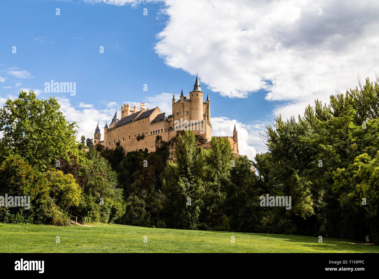 The famous view of the Alcazar of Segovia in a sunny summer day from the view point of la Pradera de San Marcos, Segovia, Castilla y Leon, Spain Stock Photo
