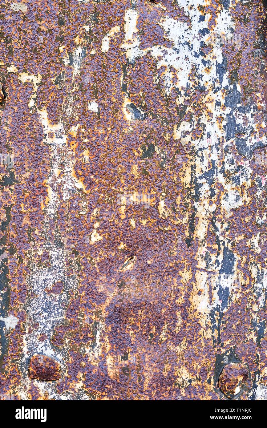Abstract multicolored rusty metal background or corroded metal texture. Stock Photo
