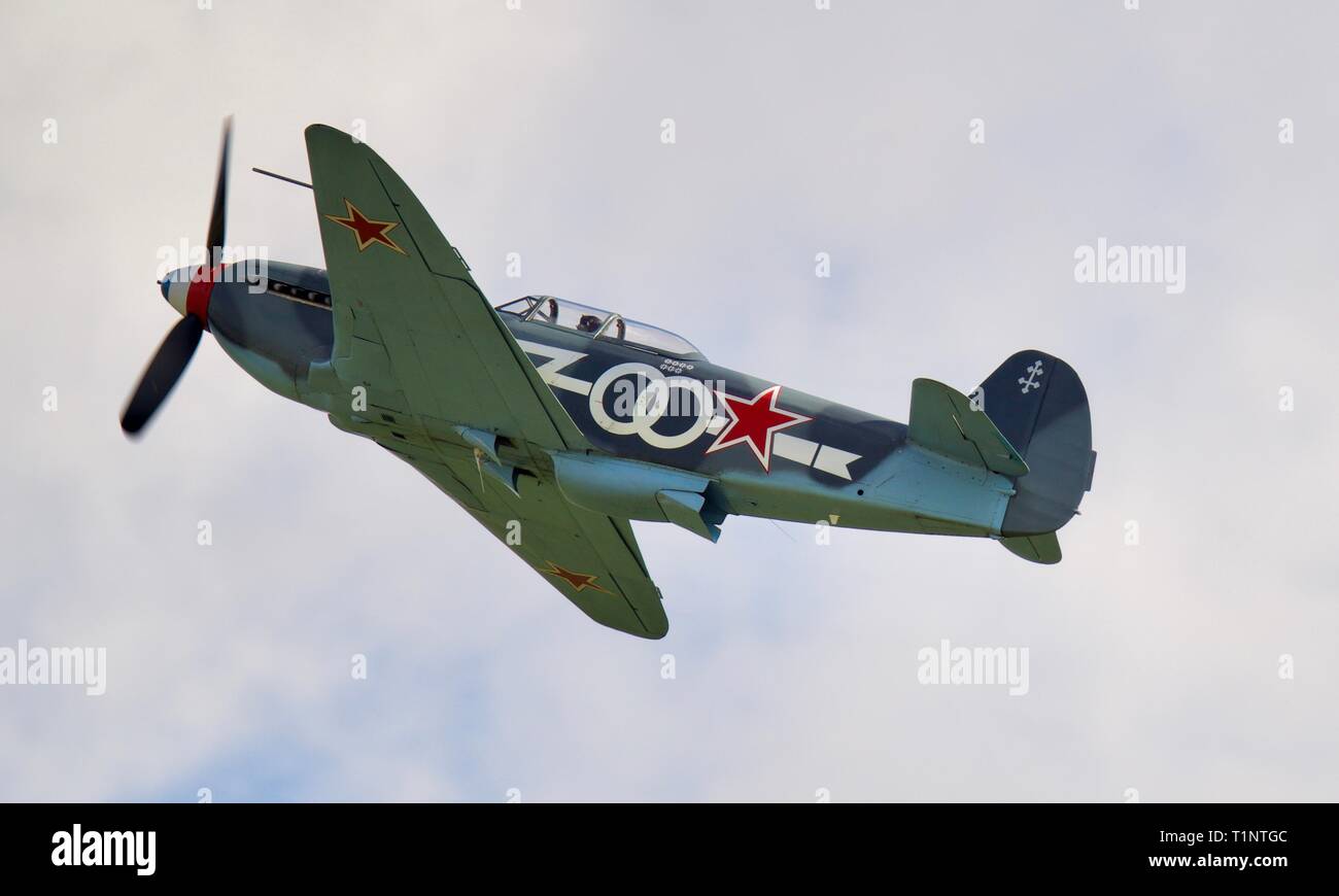 Will Greenwood’s Yak-3 (G-OLEG) flying at the Battle of Britain airshow at the Imperial War Museum on the 23rd September 2018 Stock Photo