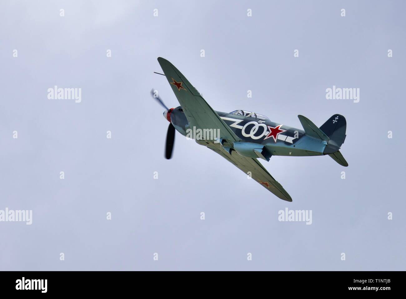 Will Greenwood’s Yak-3 (G-OLEG) flying at the Battle of Britain airshow at the Imperial War Museum on the 23rd September 2018 Stock Photo