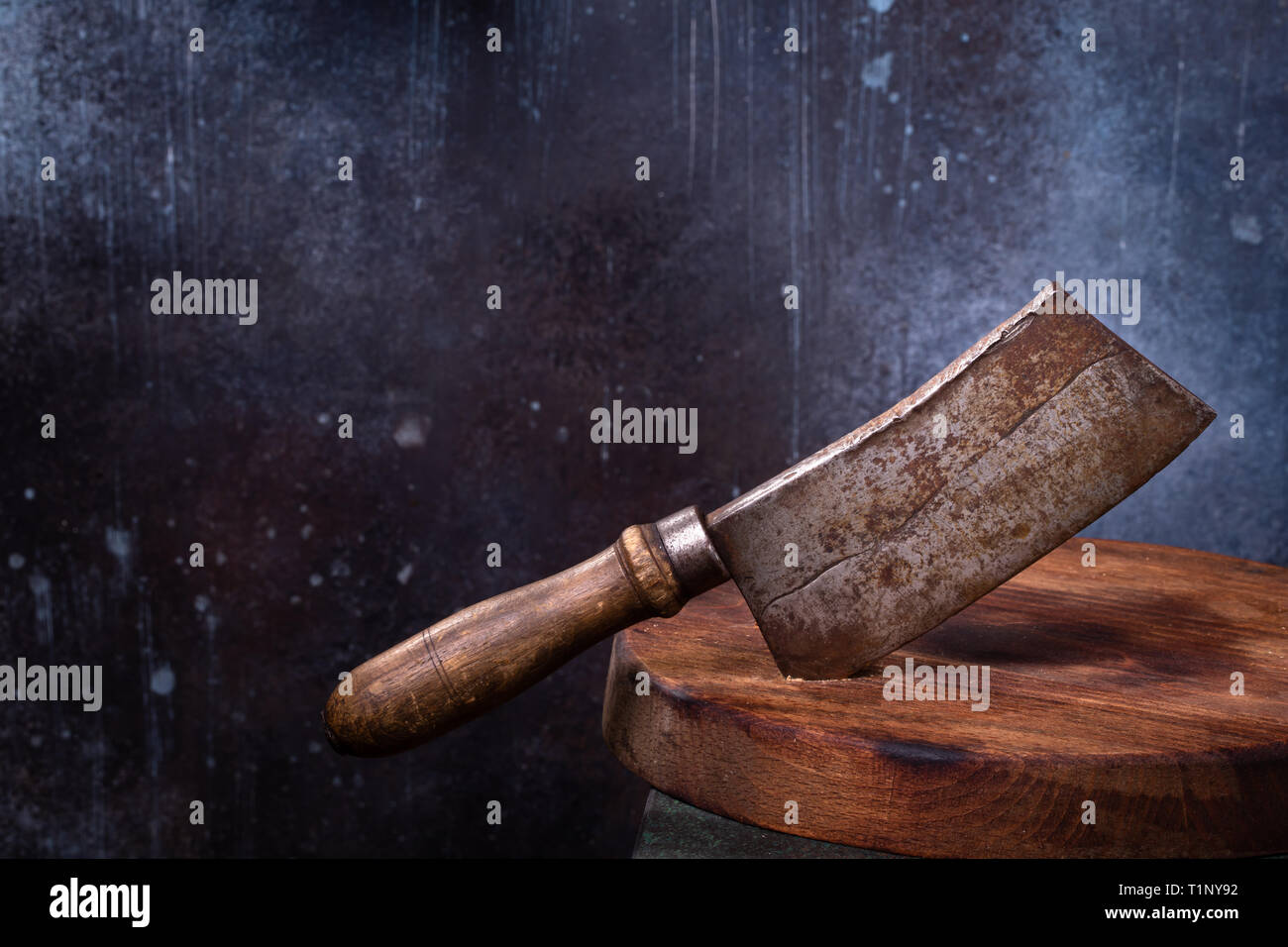 Meat cleaver cut in board Stock Photo Alamy
