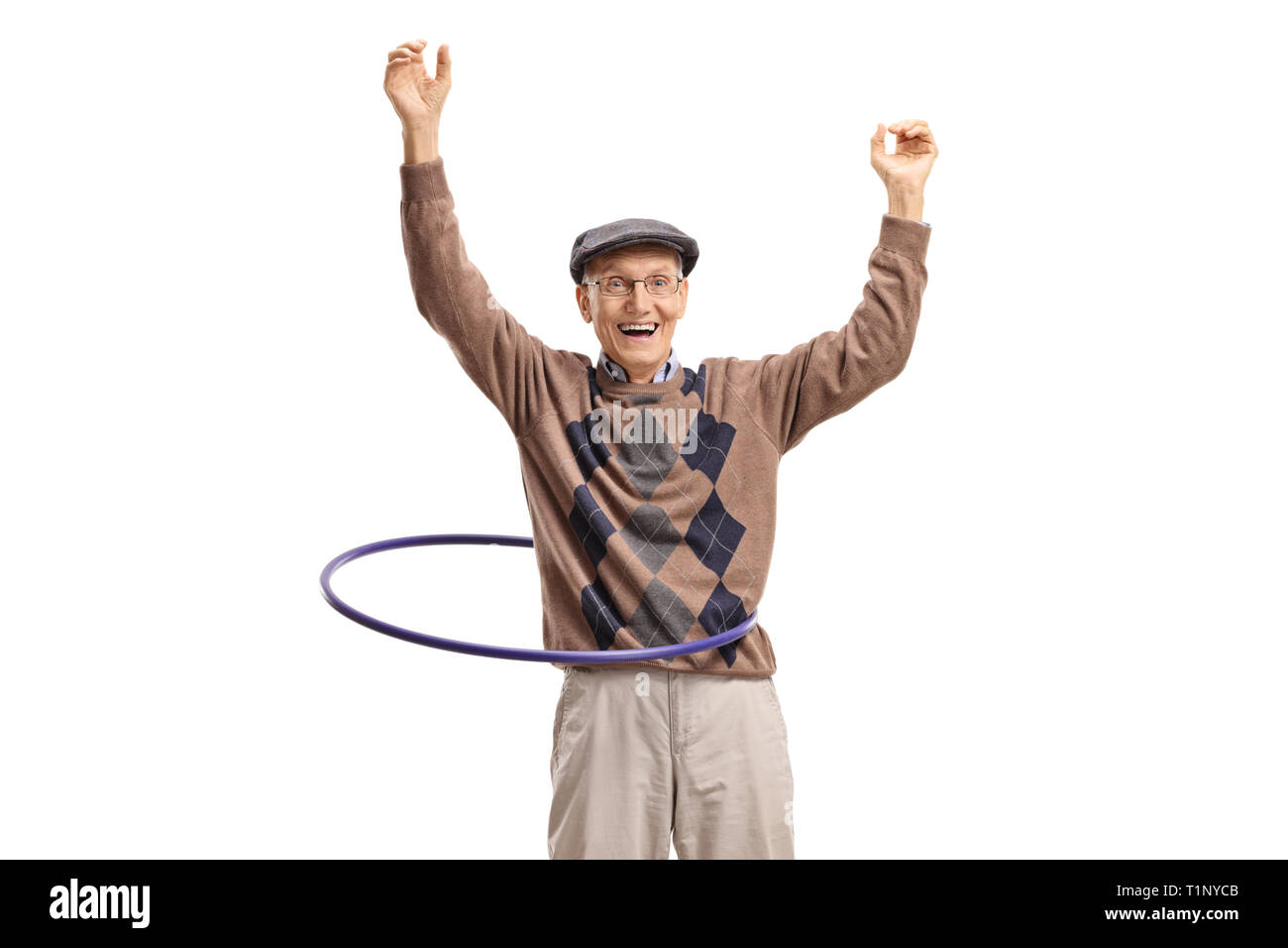 Senior man raising hands with a hula hoop isolated on white background Stock Photo