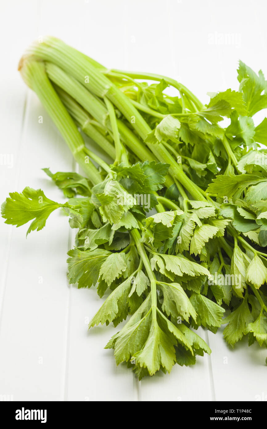 Bunch of fresh celery stalk on white table Stock Photo Alamy