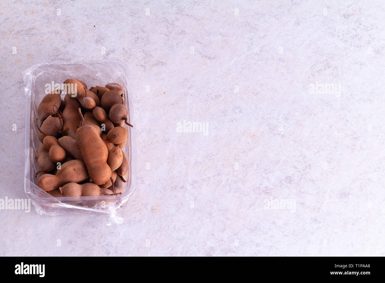 Tamarind fruit with white background Stock Photo