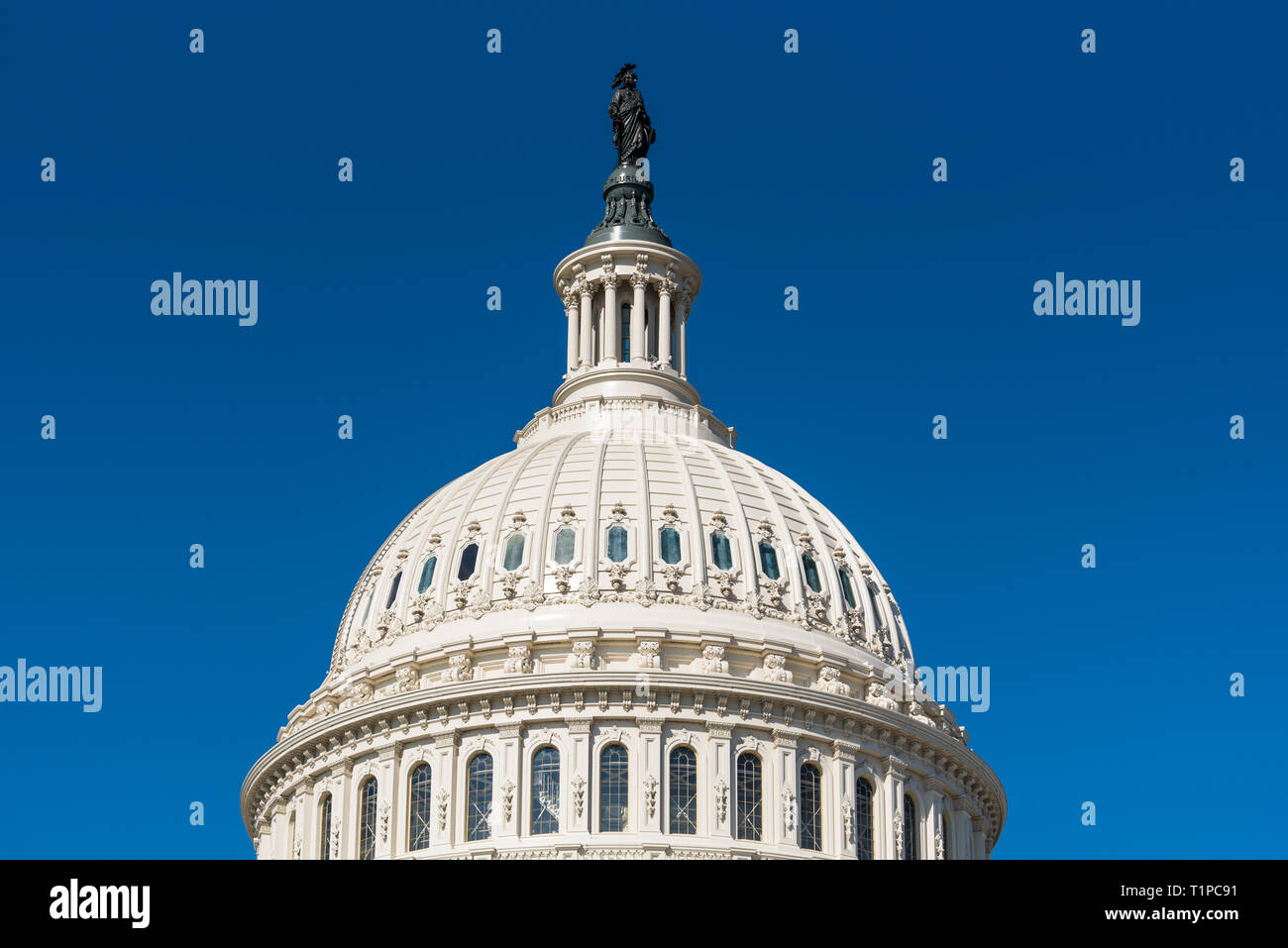 Cupola or dome of the US Capitol building in Washington DC with Statue