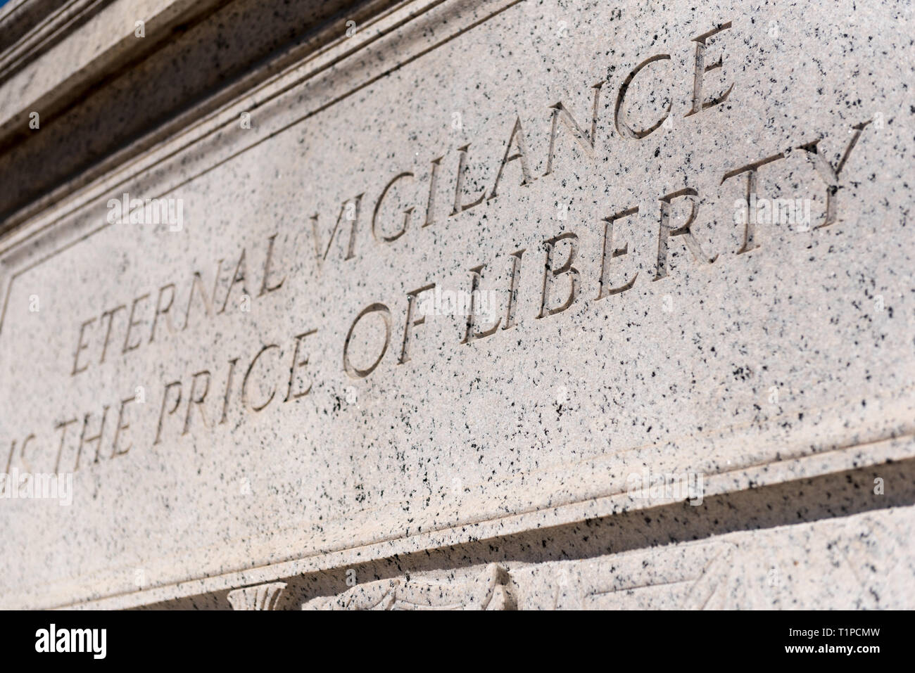 Carved plaque on exterior of the National Archives in Washington DC, USA proclaiming that Eternal Vigilance is the Price of Liberty Stock Photo