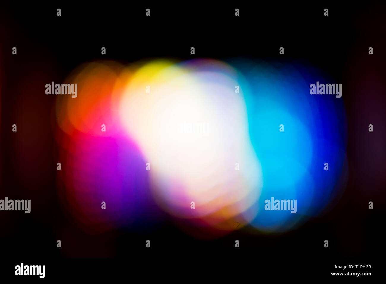 Colorful bokeh lights on a black background Stock Photo - Alamy