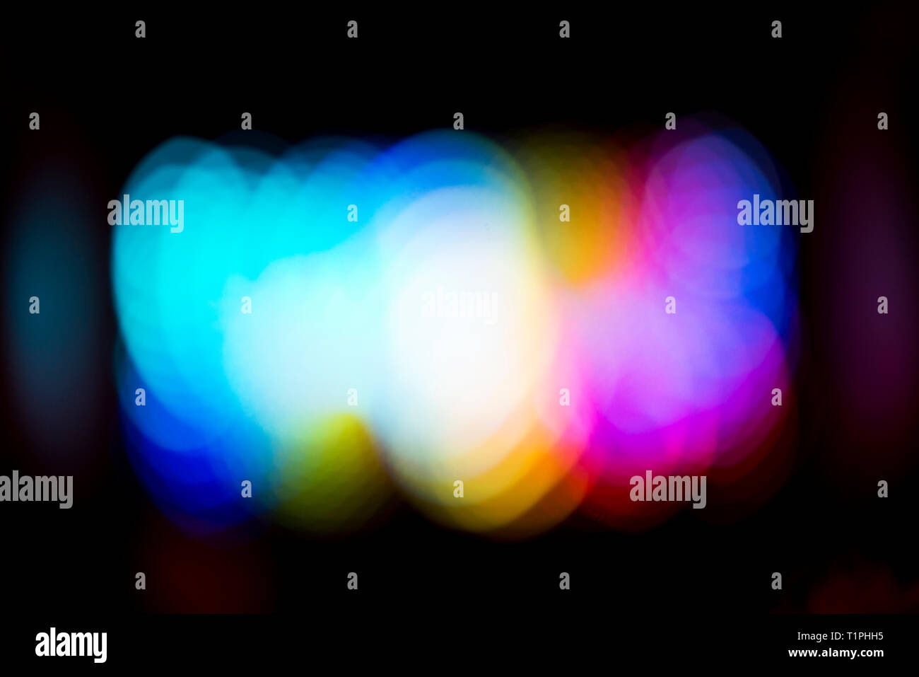 Colorful bokeh lights on a black background Stock Photo - Alamy