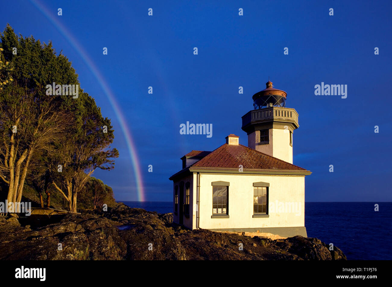 WA05431-00...WASHINGTON - Lime Kiln Lighthouse on San Juan Island over looks the Haro Strait. Stock Photo