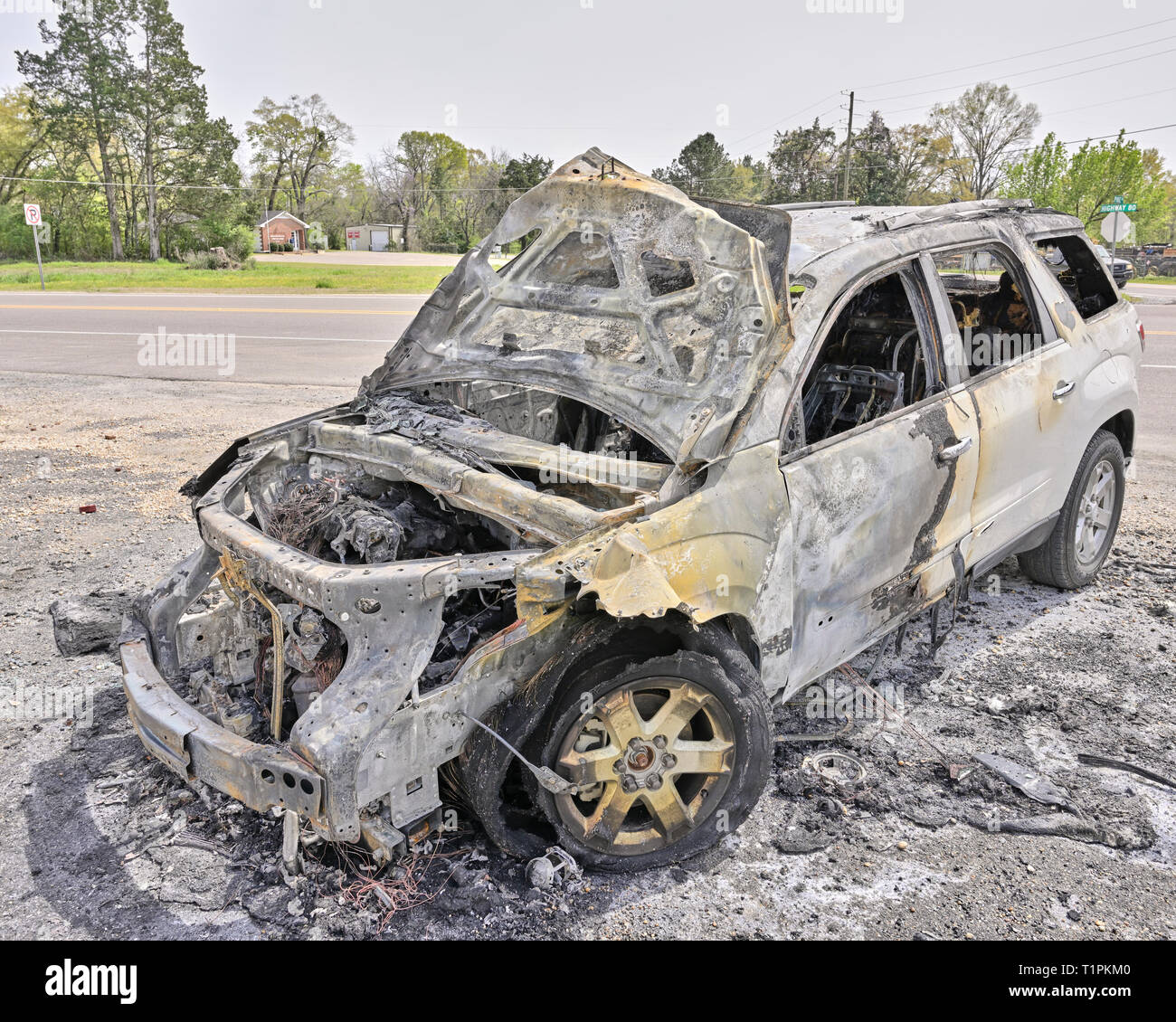 Burned out car or suv on the side of the road in rural Alabama, USA. Stock Photo