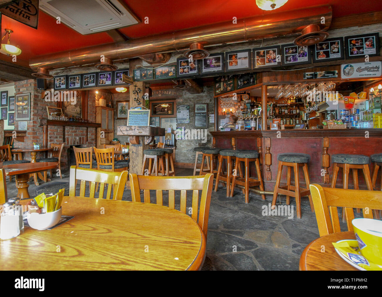 The bar and tables inside McGrory's Hotel, Culdaff in County Donegal Ireland. The family run hotel is a popular music venue in Donegal. Stock Photo