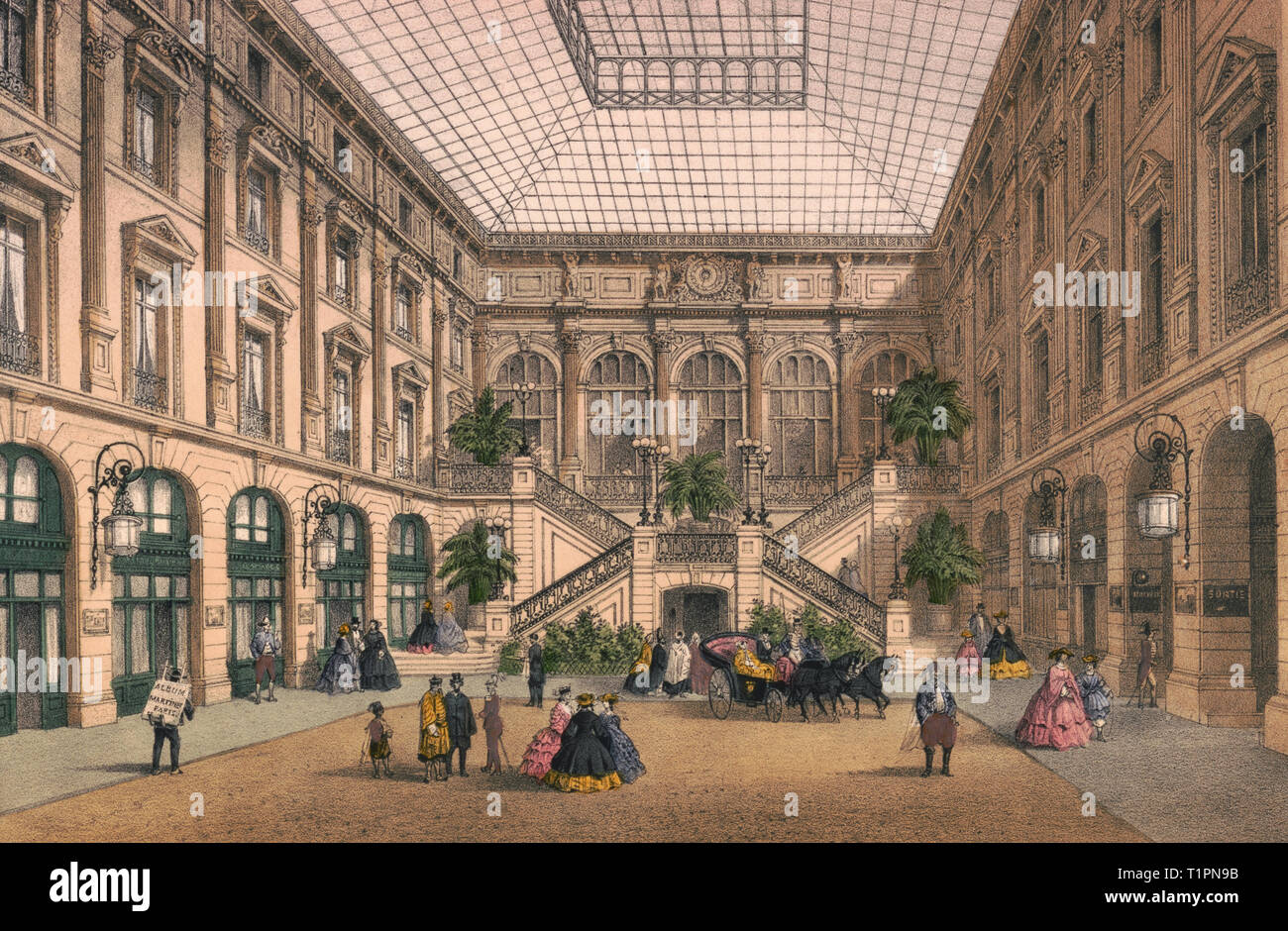 Paris. Cour du Grand Hotel du Louvre - Print shows an interior view of a covered courtyard with a horse-drawn carriage, pedestrians, and a street vendor selling papers labeled 'Album Martinet Paris'; also shows a large stairway at the far end and entrances to apartments or shops and to transportation facilities on the sides. Circa 1870 Stock Photo