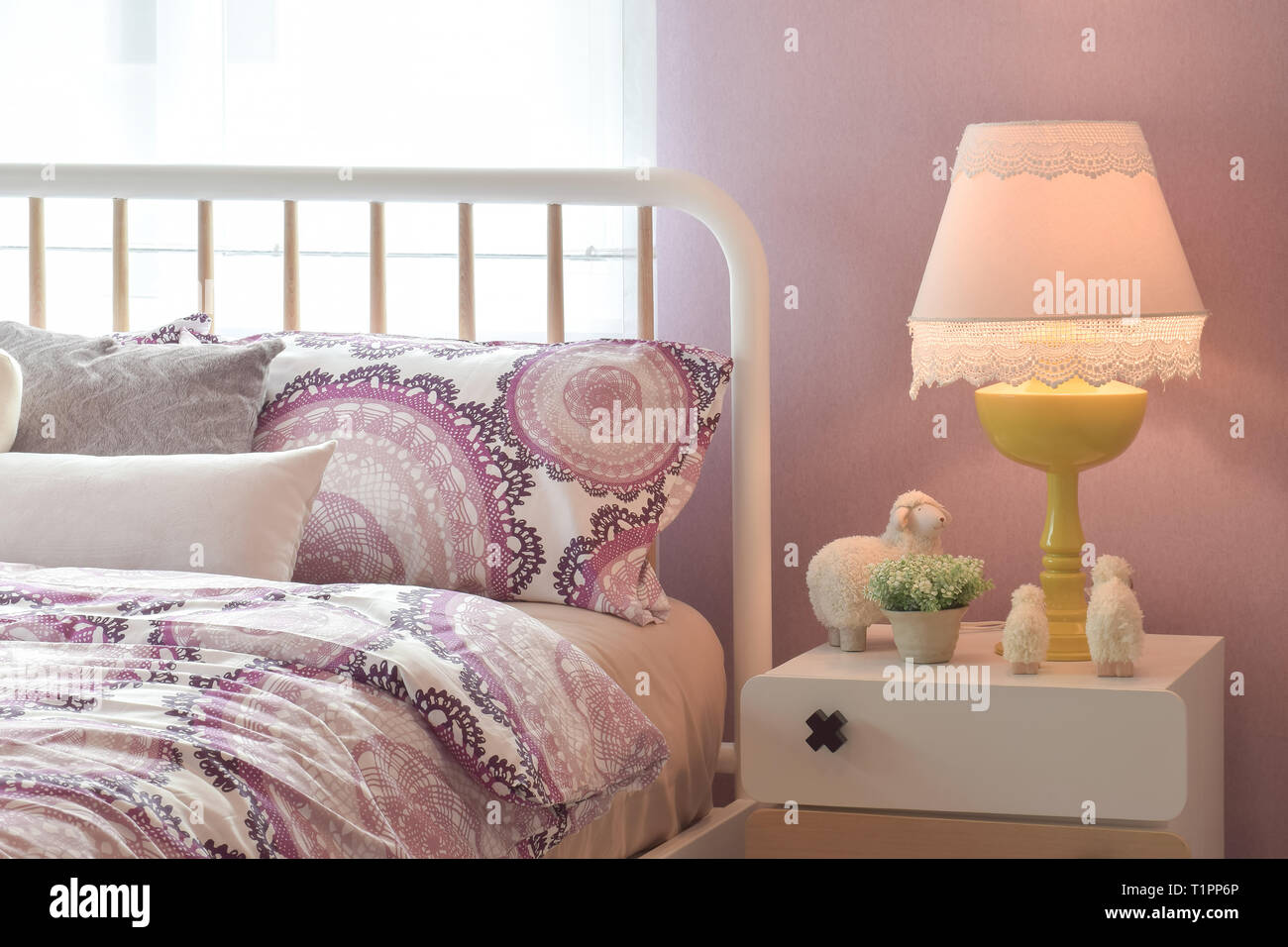 Cozy Bedroom Interior With Pillows And Reading Lamp On