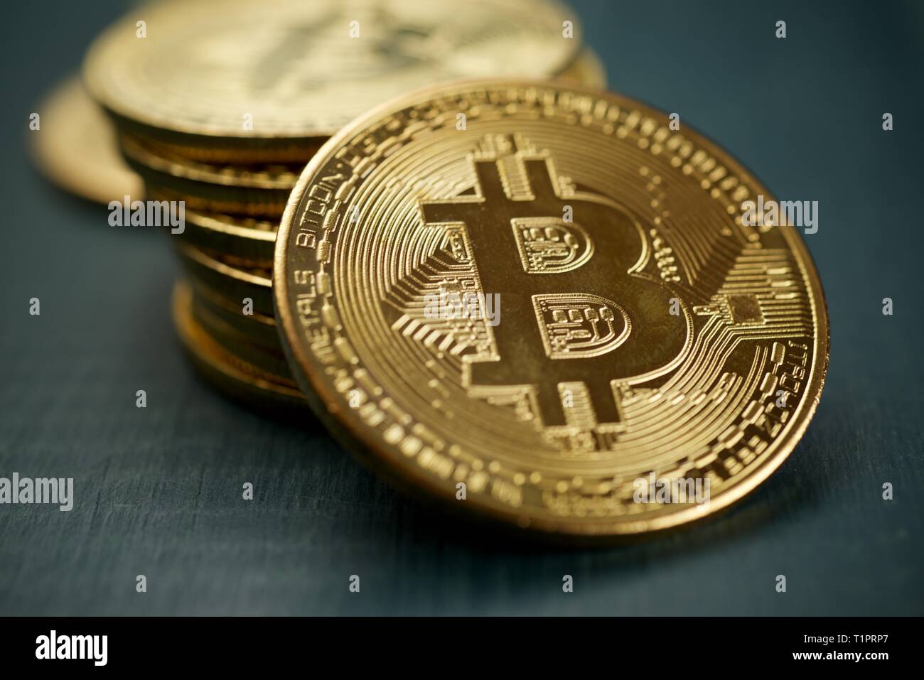 Bitcoins on a wood table. Stock Photo