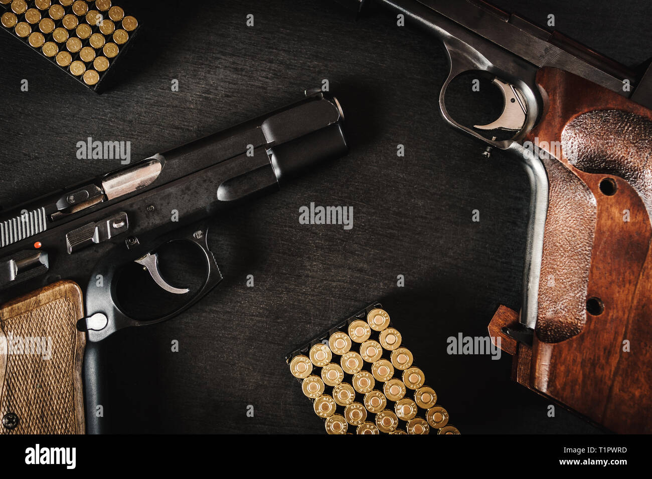 Black pistols bullets on hi-res stock photography and images - Alamy