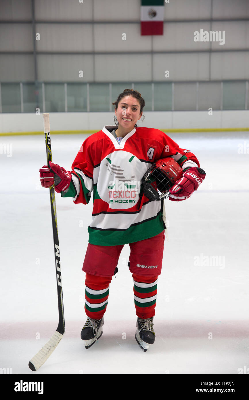 Portrait of Macarena Cruz Ceballos, 23, one of the defender of the Selección femenil de México de hockey, after a match at the Winter Sports Center Metepec in Metepec, State of Mexico, Mexico on February 15, 2019. The team played against the Buffalos Metepec in the “Midget” Hockey League, the score was 3-3. Macarena lives with her parents in San Jerónimo Lídice, an affluent residential neighborhood in Mexico City. Her brother lives in Canada, where he plays ice hockey in the Junior League. She studies economics and finance at the Monterrey Institute of Technology, at the Mexico City campus. Sh Stock Photo