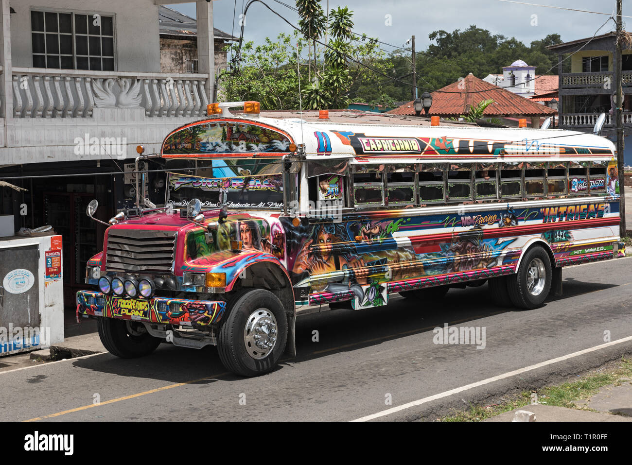 colorful painted chicken bus in portobelo, panama Stock Photo