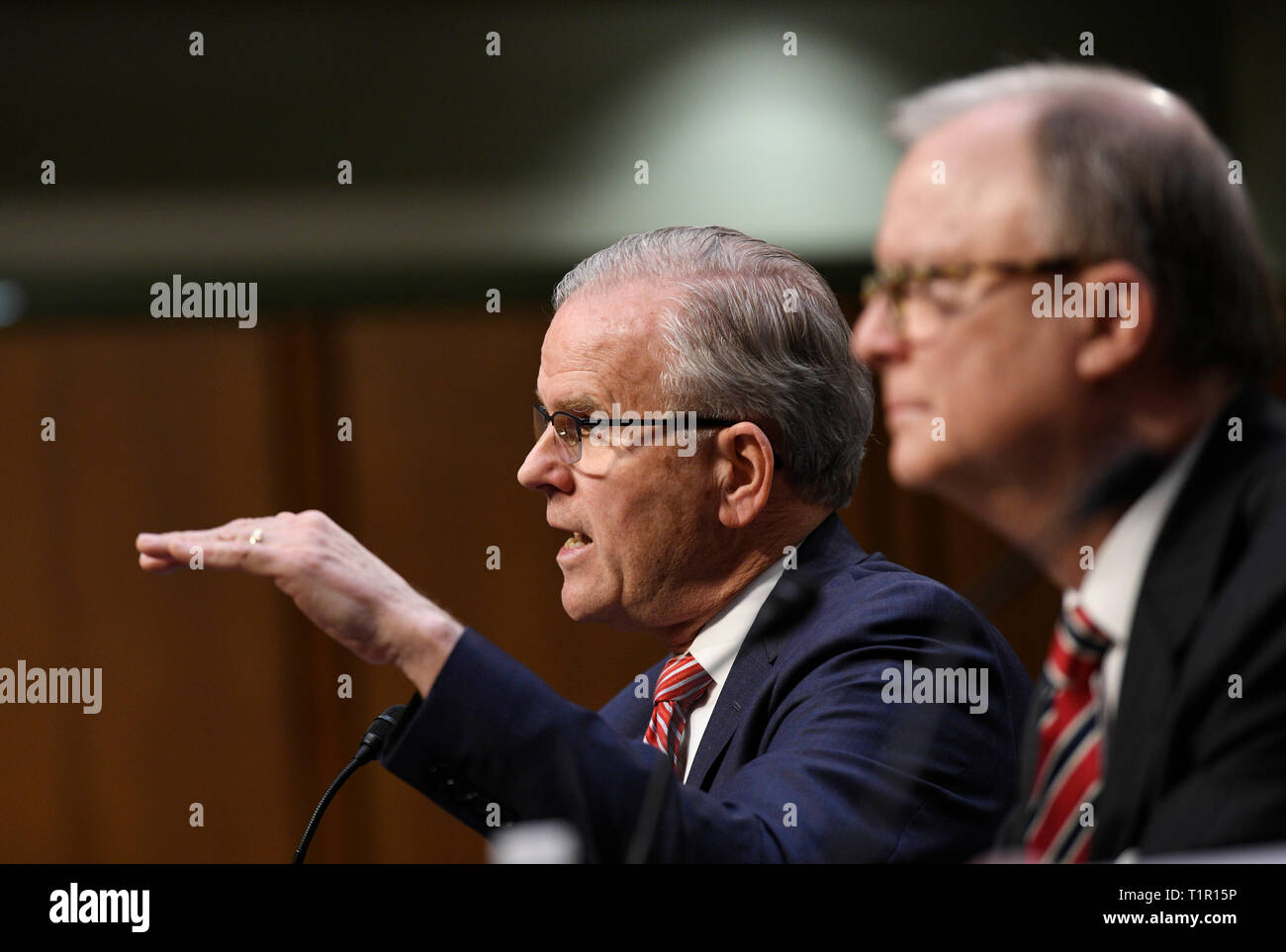 Washington, USA. 27th Mar, 2019. Daniel Elwell (L), acting administrator of U.S. Federal Aviation Administration (FAA), speaks at a Senate Commerce Committee hearing on airline safety in Washington, DC, the United States, on March 27, 2019. The U.S. Federal Aviation Administration (FAA) on Wednesday vowed to revamp its air safety oversight after two deadly crashes involving Boeing 737 Max jets in less than five months pointed to possible lapses in the aircraft approval process. Credit: Liu Jie/Xinhua/Alamy Live News Stock Photo