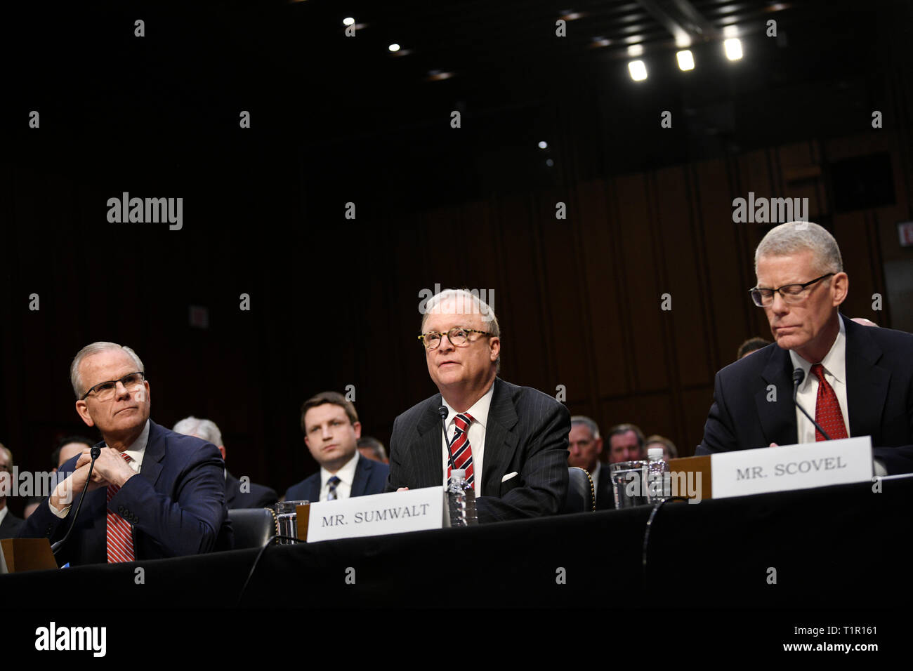 (190327) -- WASHINGTON, March 27, 2019 (Xinhua) -- Daniel Elwell (front, L), acting administrator of the U.S. Federal Aviation Administration (FAA), Robert Sumwalt (front, C), Chairman of the U.S. National Transportation Safety Board (NTSB), and Calvin Scovel (front, R), the U.S. Transportation Department's inspector general, attend a Senate Commerce Committee hearing on airline safety in Washington, DC, the United States, on March 27, 2019. The U.S. Federal Aviation Administration (FAA) on Wednesday vowed to revamp its air safety oversight after two deadly crashes involving Boeing 737 Max je Stock Photo