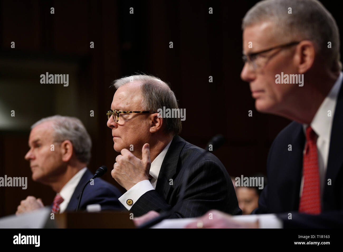 (190327) -- WASHINGTON, March 27, 2019 (Xinhua) -- Daniel Elwell (L), acting administrator of the U.S. Federal Aviation Administration (FAA), Robert Sumwalt (C), Chairman of the U.S. National Transportation Safety Board (NTSB), and Calvin Scovel, the U.S. Transportation Department's inspector general, attend a Senate Commerce Committee hearing on airline safety in Washington, DC, the United States, on March 27, 2019. The U.S. Federal Aviation Administration (FAA) on Wednesday vowed to revamp its air safety oversight after two deadly crashes involving Boeing 737 Max jets in less than five mont Stock Photo