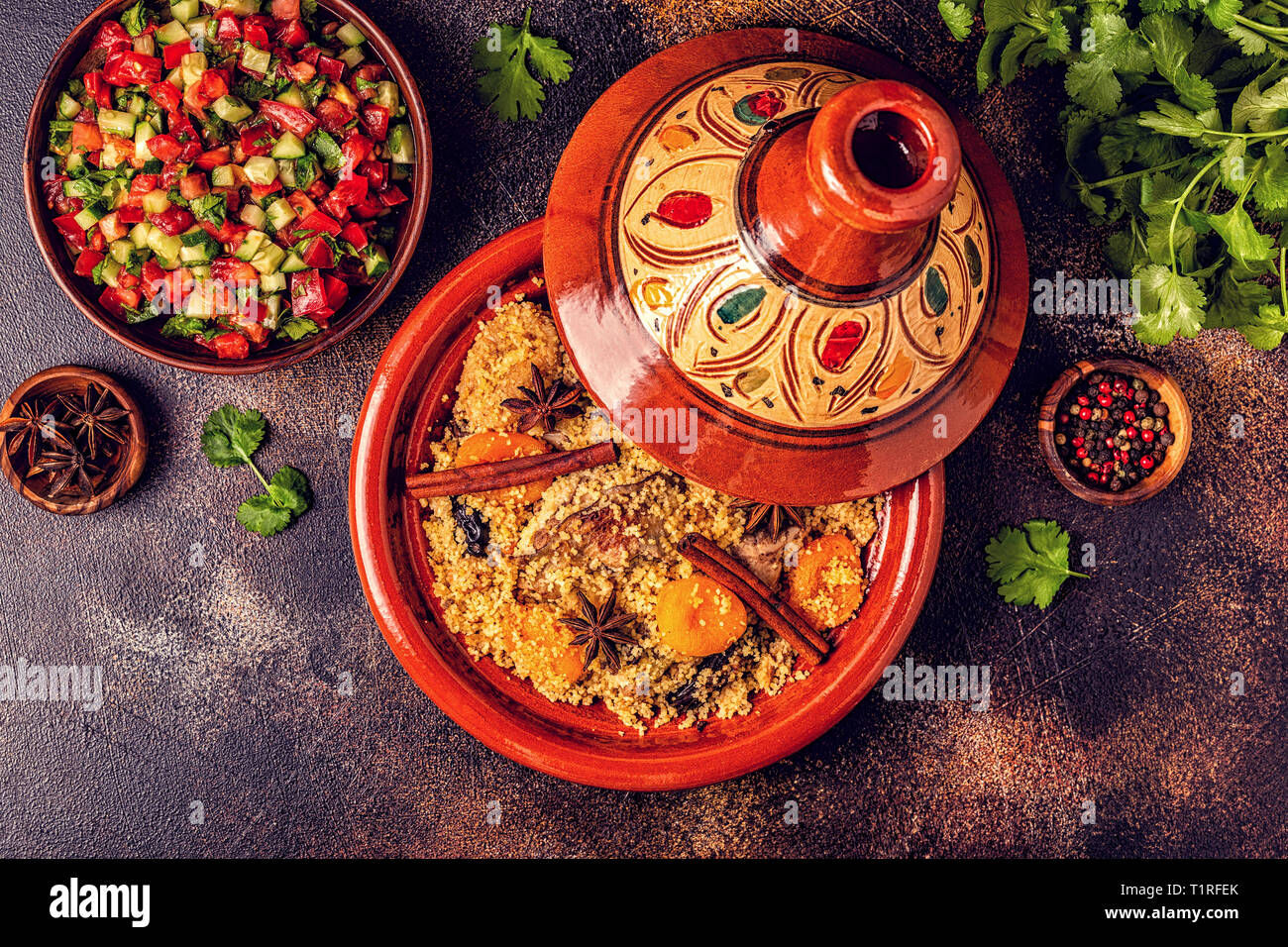 Traditional moroccan tajine of chicken with dried fruits and spices, top  view Stock Photo - Alamy