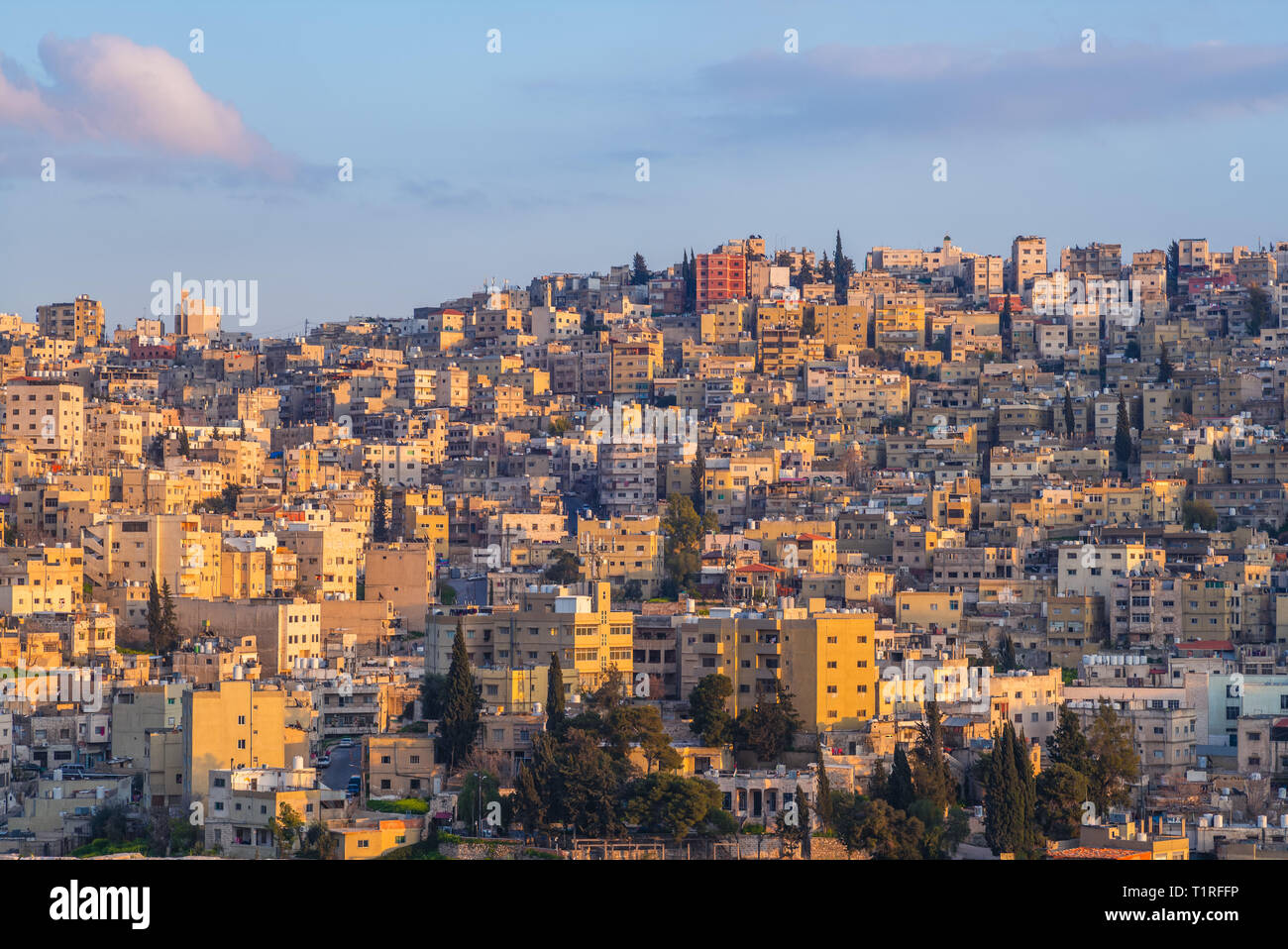 skyline of Amman, capital of Jordan, at dusk Stock Photo