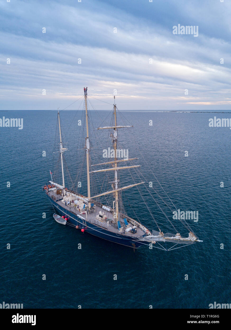 The sail training ship Leeuwin II anchored near Big Rat island in the