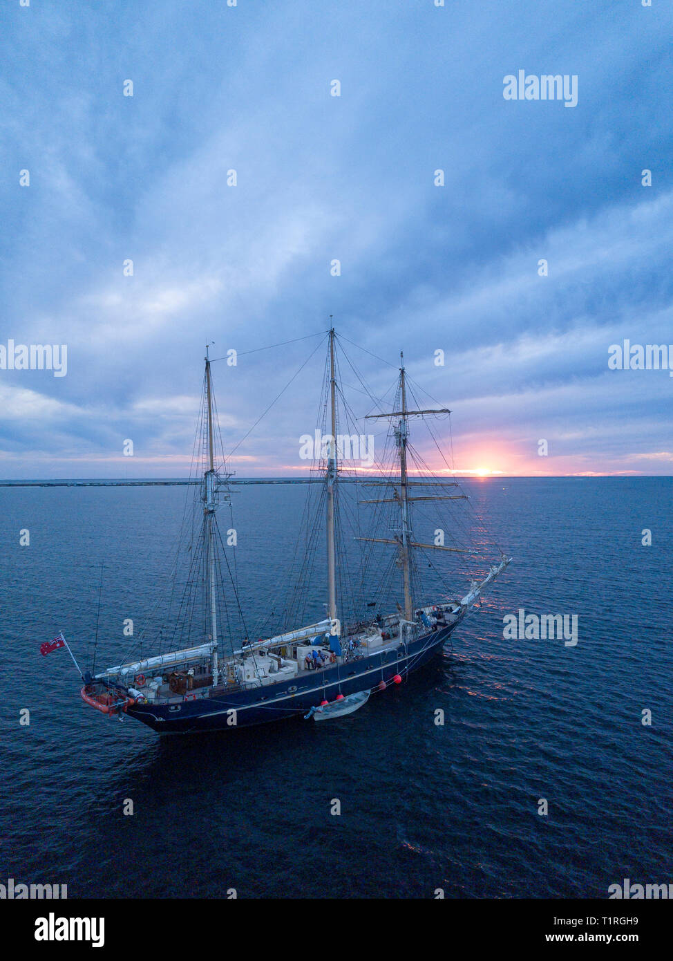 The sail training ship Leeuwin II anchored near Big Rat island in the