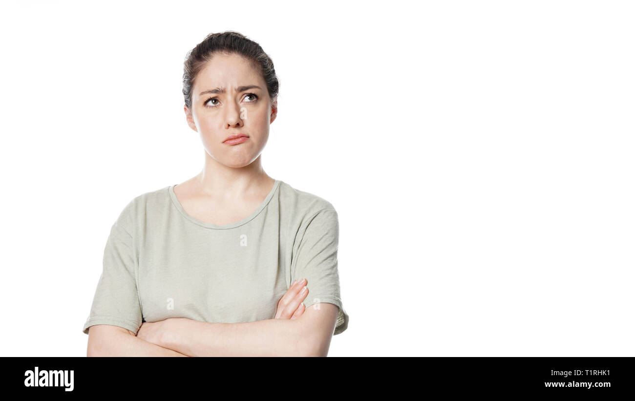 unhappy concerned young woman thinking Stock Photo