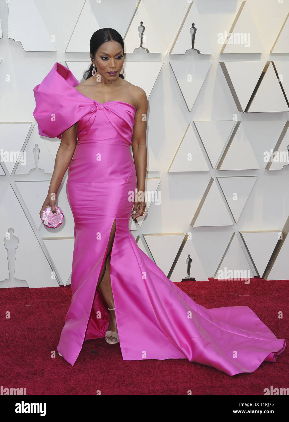 angela bassett pink dress Angela Bassett Wears Reem Acra Gown to 2019 Oscars