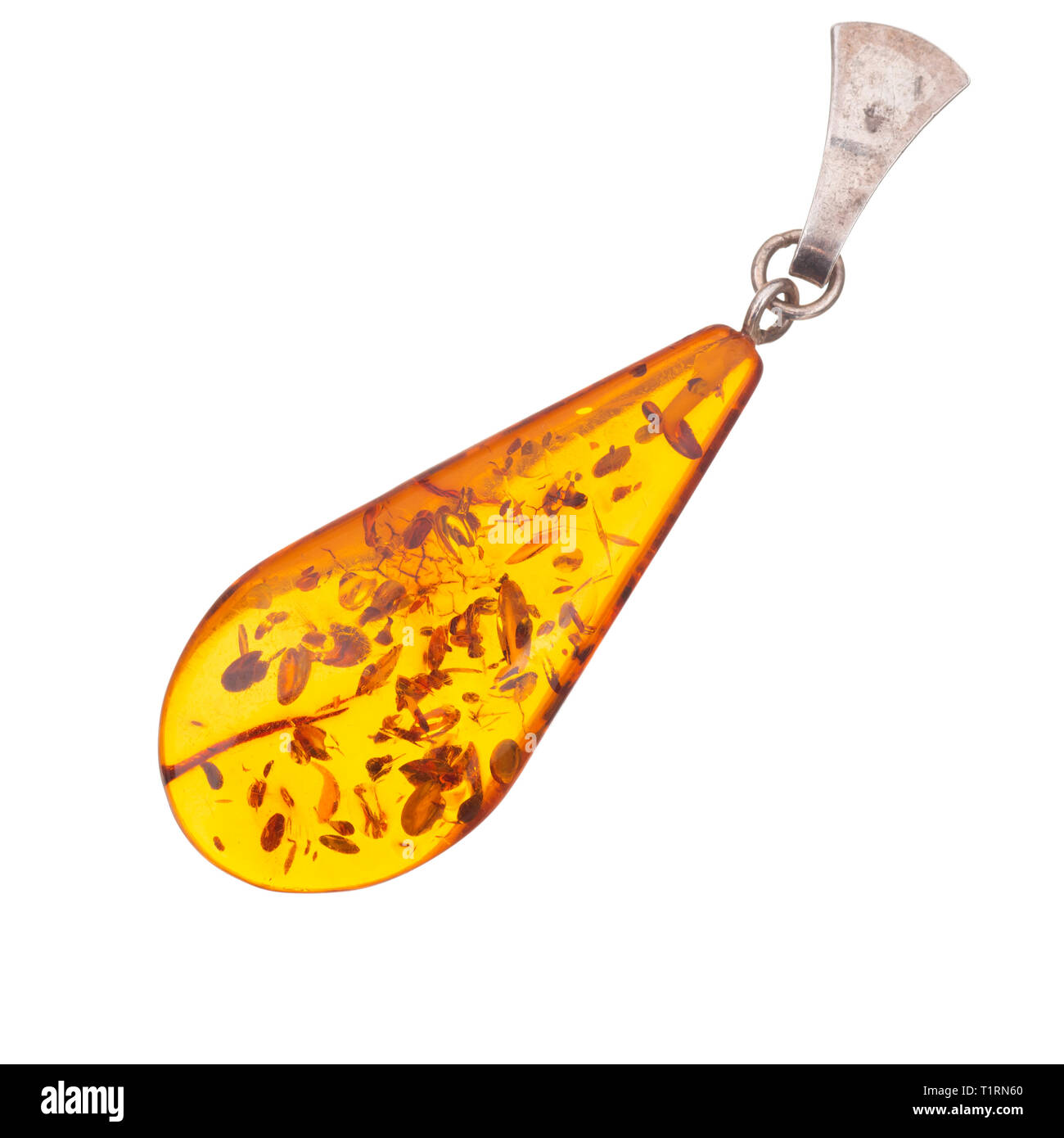 Amber pendant, almost certainly fake. Isolated on white. Stock Photo