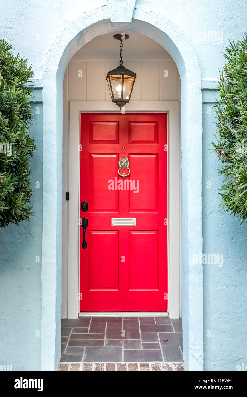 Red elegant entrance door Stock Photo Alamy