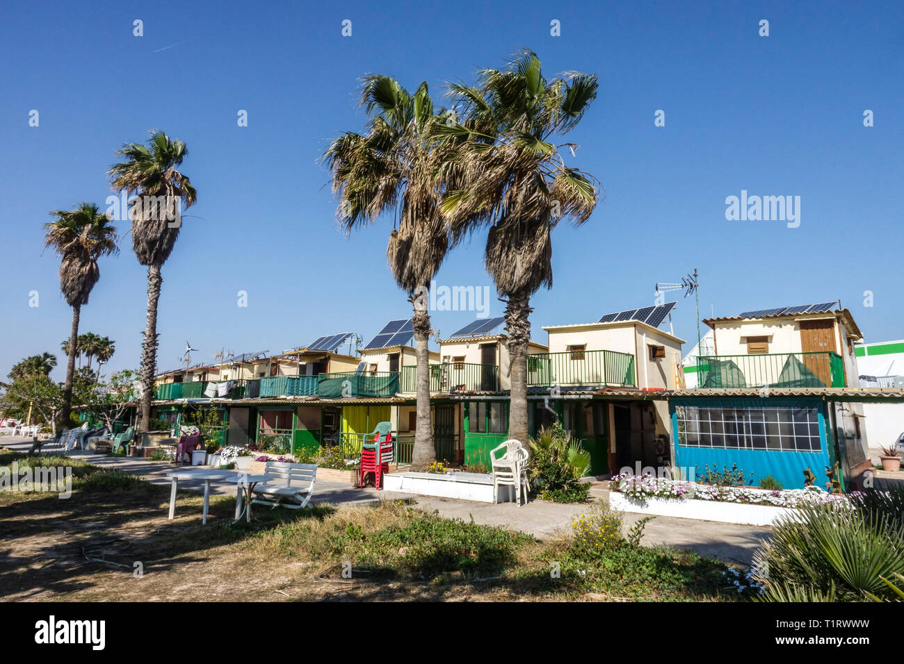 Small Houses of Fishermen is a group of 31 houses permanently inhabited all year round, it is amazing architecture, Alboraya, Valencia Spain Stock Photo