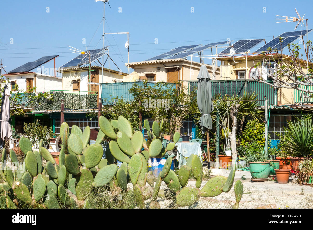 Small houses of fishermen is a group of 31 houses permanently inhabited all year round, is amazing architecture, Alboraya, Valencia Spain beach houses Stock Photo