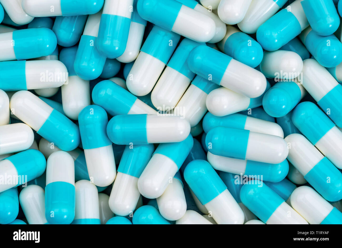 Top view pile of blue and white antibiotic capsule pills texture ...