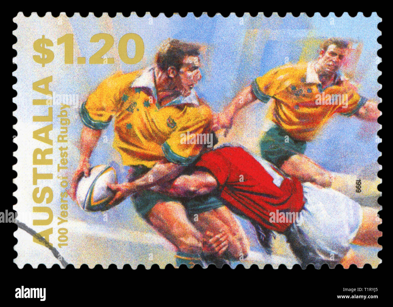AUSTRALIA - CIRCA 1999: A postage stamp printed in Australia showing an image commemorative of 100 years of rugby, circa 1999. (Isolated on black) Stock Photo