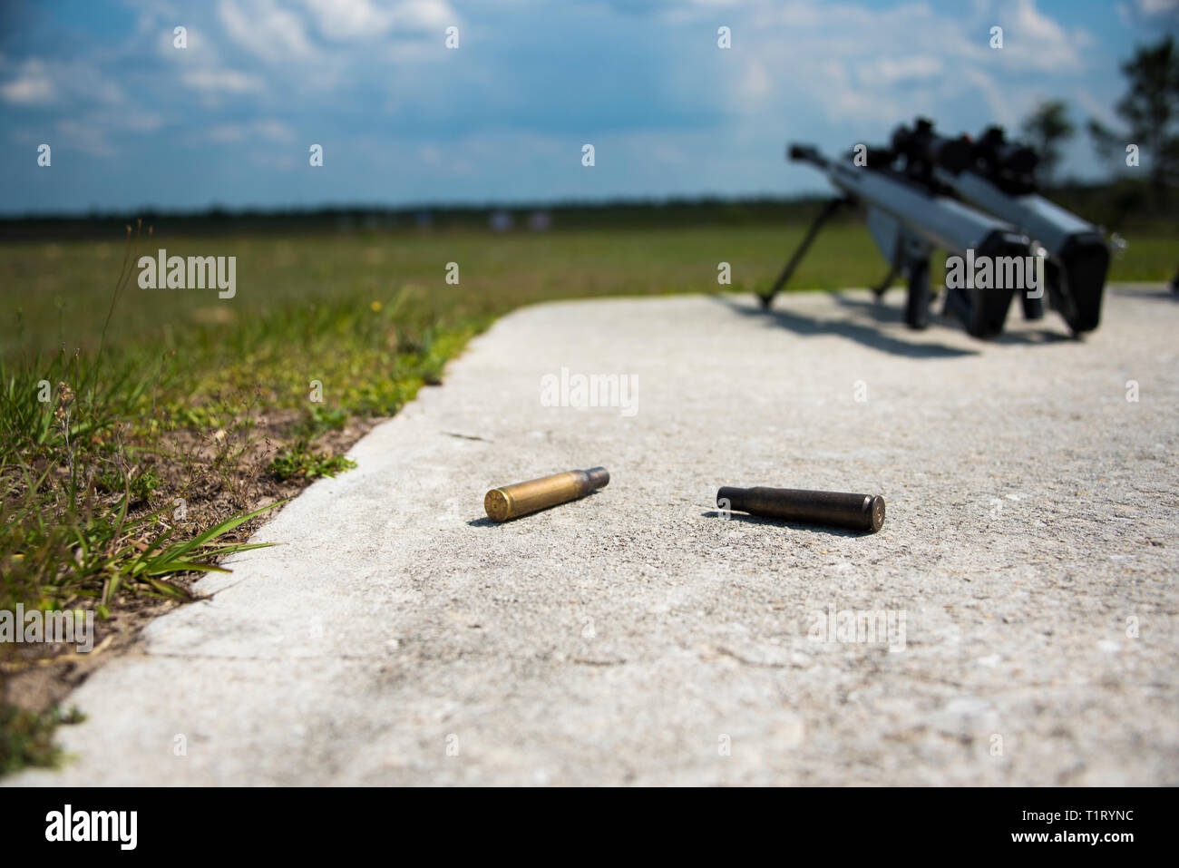 Coast Guard Helicopter Interdiction Tactical Squadron (HITRON) rifles and shells lay at rest May 9, 2018, at Camp Blanding in Starke, Florida. HITRON is an armed United States Coast Guard helicopter squadron specializing in Airborne Use of Force (AUF) and drug-interdiction missions. (U.S. Coast Guard Petty Officer 3rd Class Ryan Dickinson) Stock Photo
