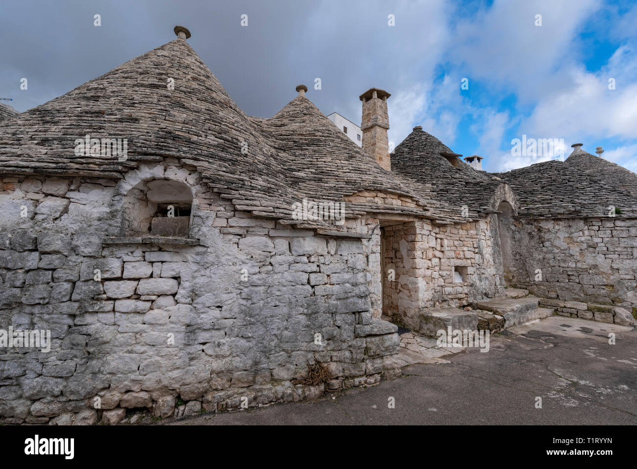 ALBEROBELLO, PUGLIA, ITALY - Alberobello's famous Trulli, the characteristic cone-roofed white houses of the Itria Valley, Apulia, Southern Italy. Stock Photo