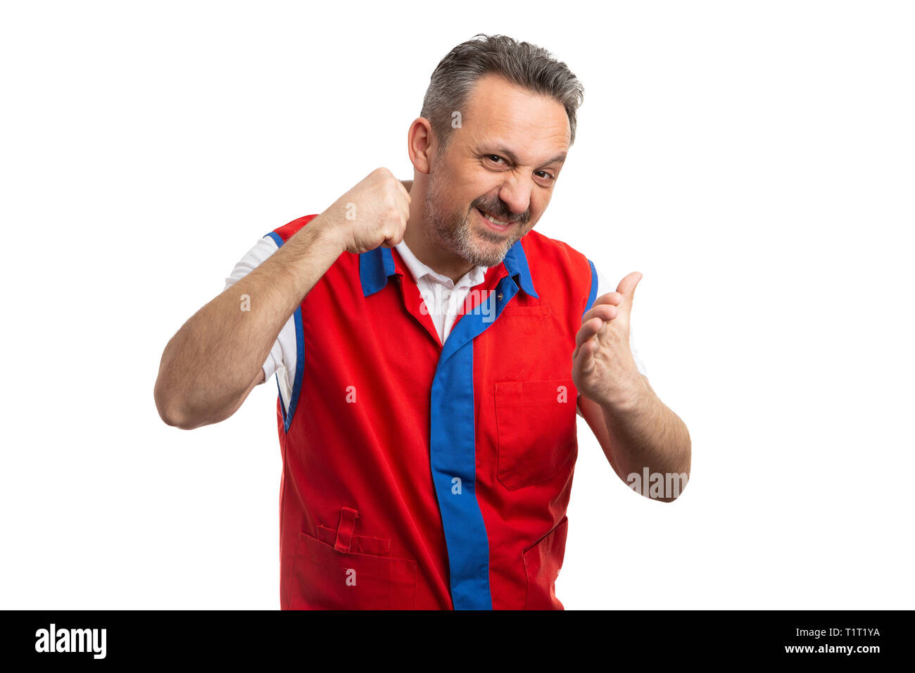 Angry male supermarket or hypermarket employee starting with intimidating gesture made by using fist and palm isolated on white Stock Photo