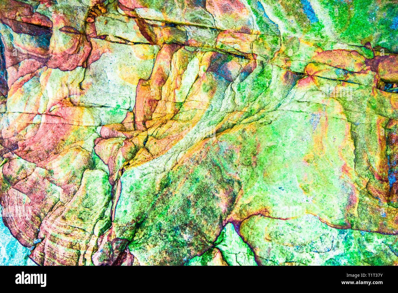 Green, red, orange sediments and minerals, rock formations - a colorful ...
