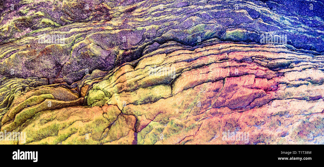 Purple, red, orange, green sediments and minerals, rock formations - a ...