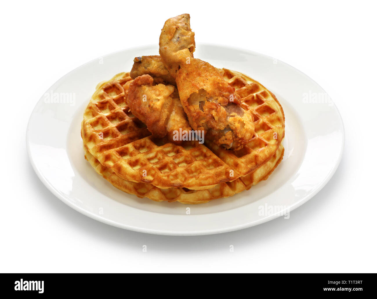 fried chicken and waffles with maple syrup, american food Stock Photo Alamy