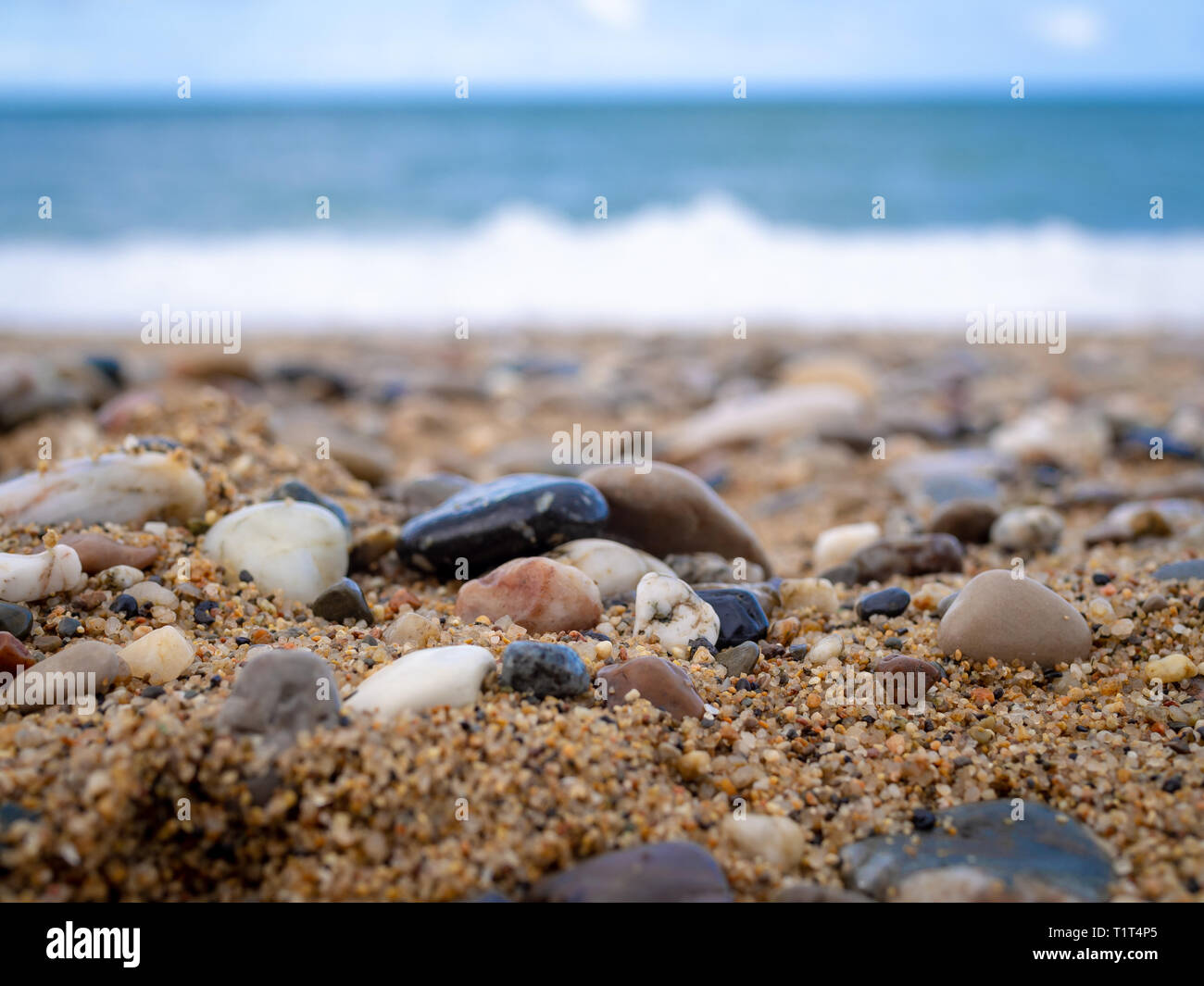 Wave pebbles hi-res stock photography and images - Alamy