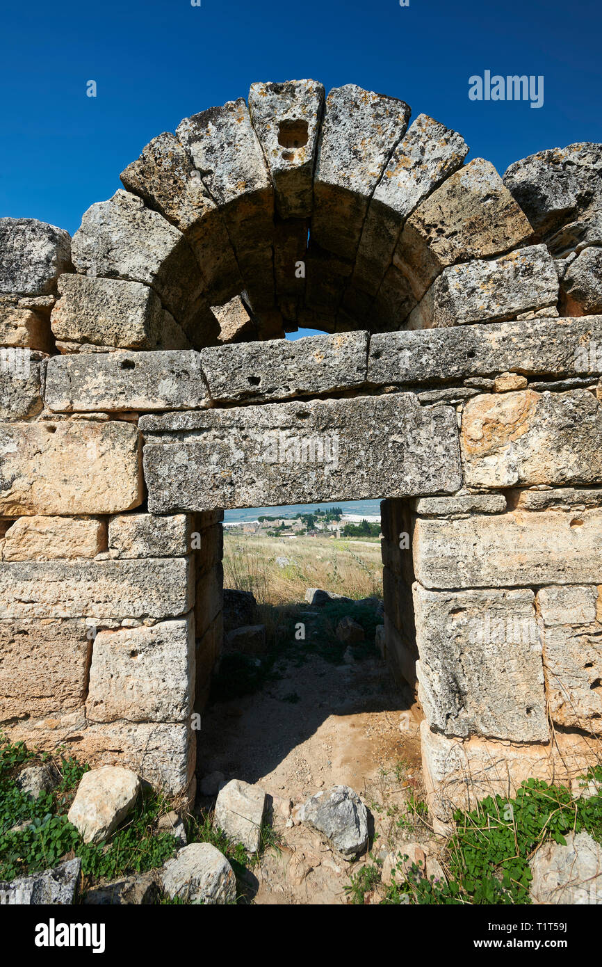 Picture of the ruins of a gate to Hieropolis. Hierapolis archaeological site near Pamukkale in Turkey. Stock Photo