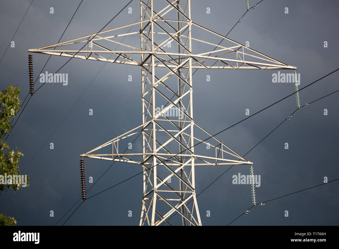 Power Industry Electrical Grid Transmission Lines to Supply Electricity with Tower Wires Stock Photo