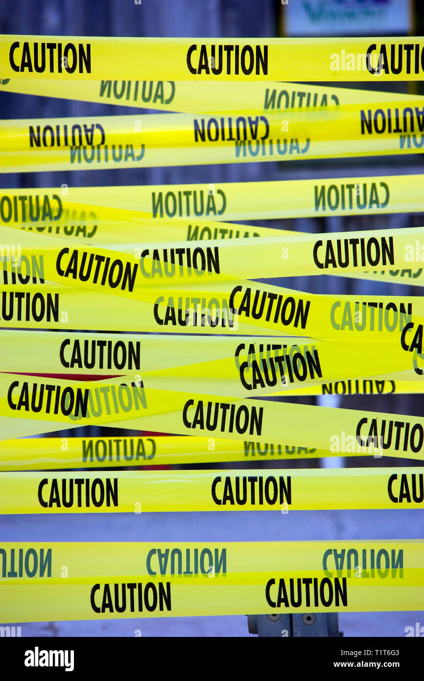 Caution tape wrap still life Stock Photo