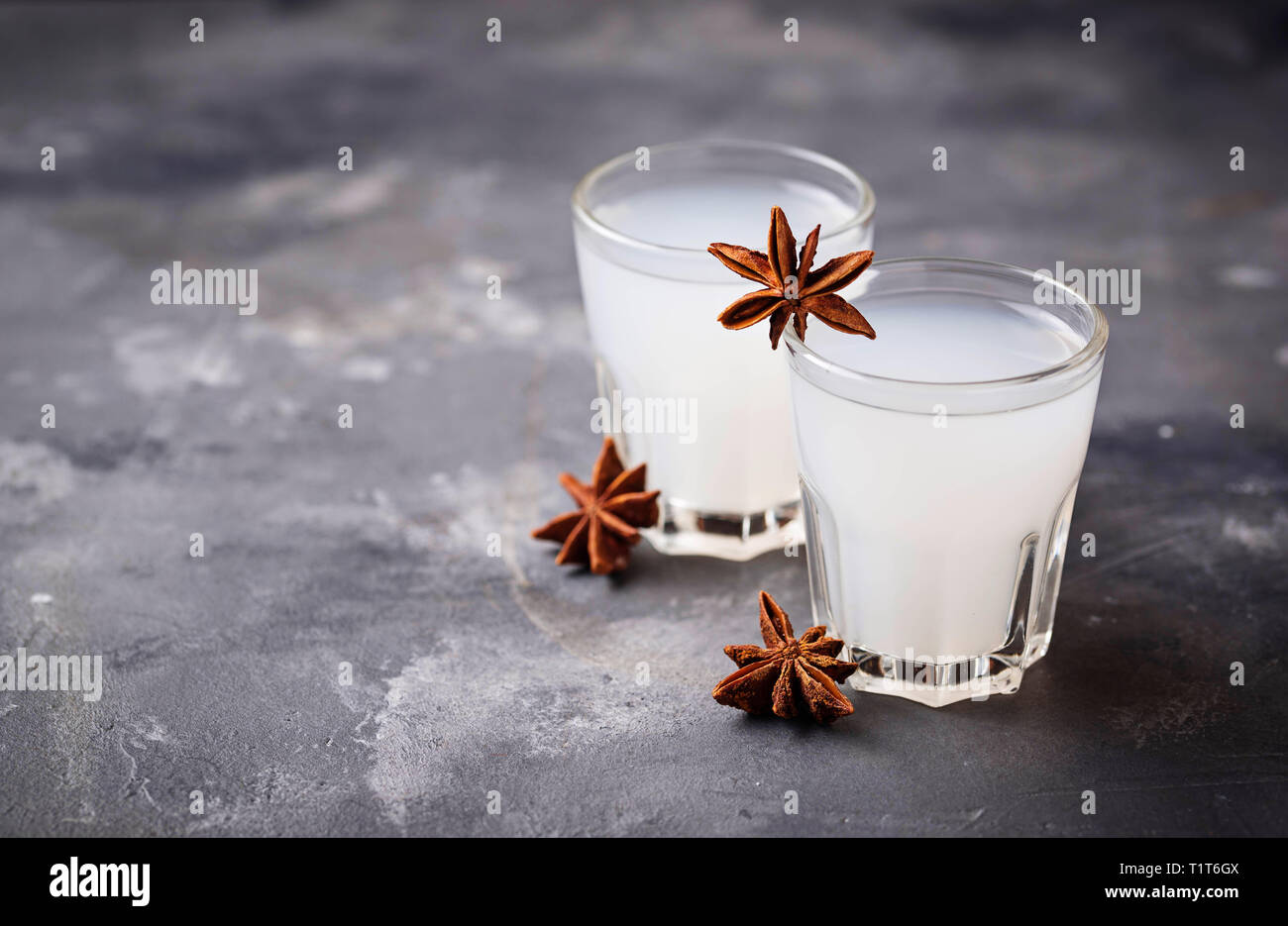 Traditional Greek ouzo,  alcohol drink with anise Stock Photo