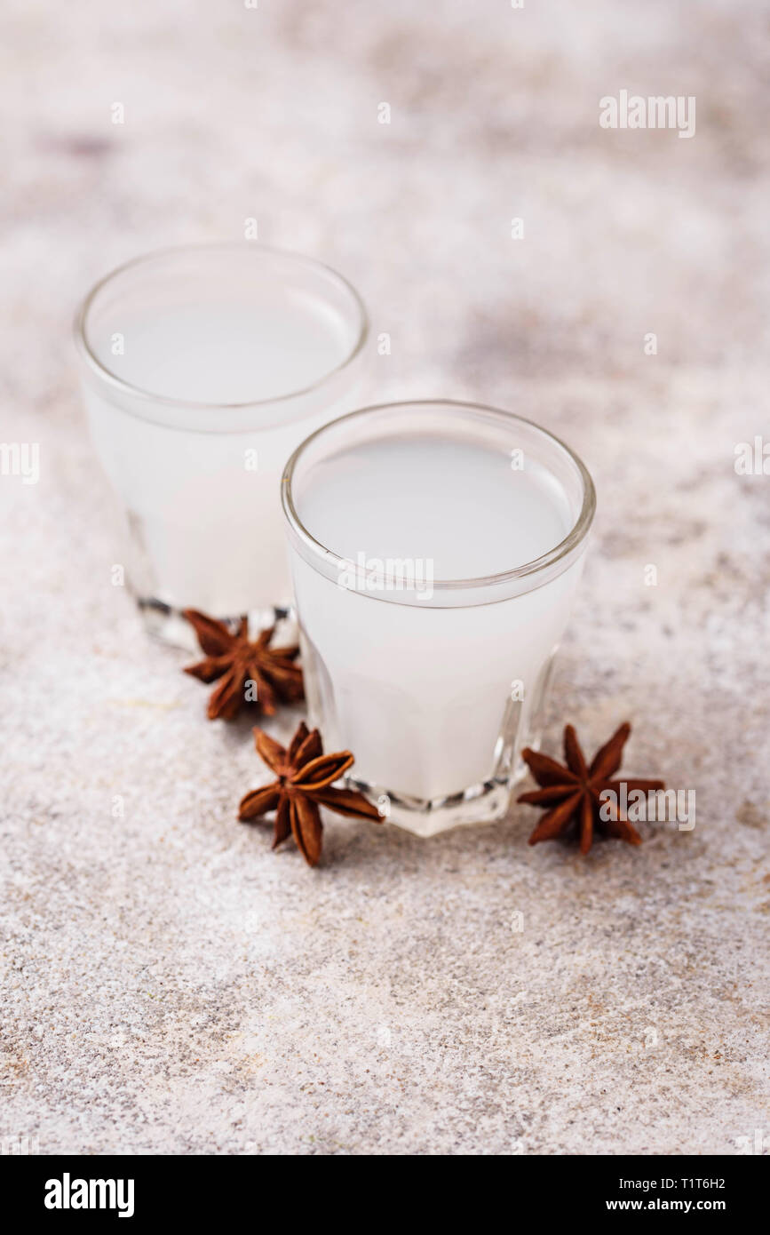 Traditional Greek ouzo,  alcohol drink with anise Stock Photo